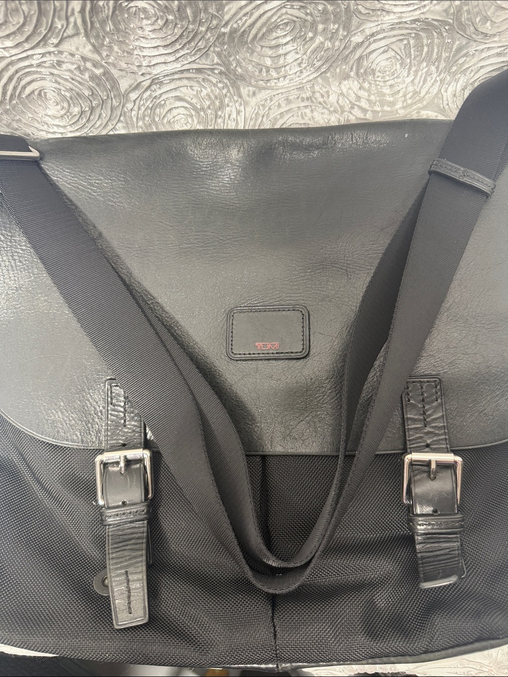 Tumi Black Men's Messenger Bag with Silver Buckles